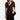 Woman wearing a black dress holding a black handbag on a white background