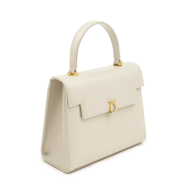 Beige handbag with a gold clasp on a white background