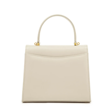 Beige handbag with gold accents on a white background