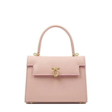 Pink handbag with gold accents on a white background