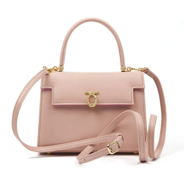Pink handbag with gold accents on a white background