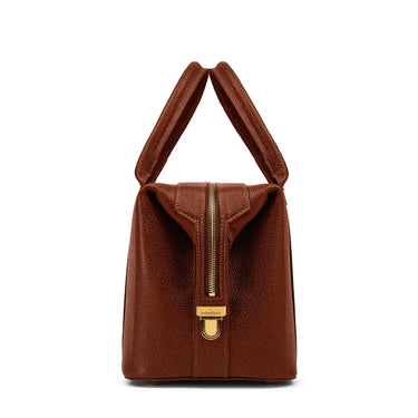 Brown leather handbag with gold zipper and clasp on a white background