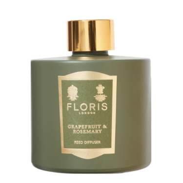 Green diffuser bottle with gold cap and 'Floris London' label on a white background