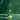 The Green One can with floral design and 'Toby & Co' branding on a green marble surface.